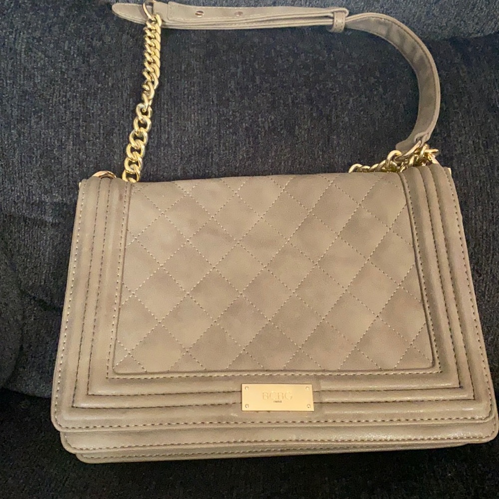 Women purse with strap inside zippered pocket